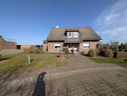Vorderansicht - Mehrfamilienhaus, Wohnhaus mit 159,00 m&sup2; in Suhlendorf zum Kaufen