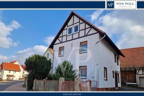 Bild 1 - Einfamilienhaus mit großer Scheune und Garten mit Obstbaumbestand