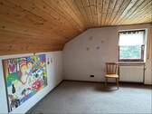Gäste- oder Kinderzimmer im Dachgeschoss - 