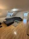 Wohnzimmer - Helle 3-Zi.-DG-Wohnung mit Einbauküche, Abstellraum & Keller in Altenstadt-Lindheim