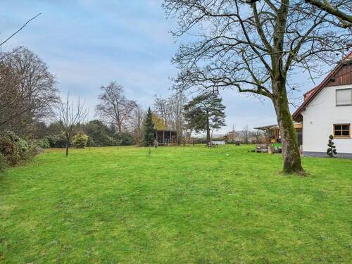Gartenansicht im Einfahrtsbereich - Mehrfamilienhaus, Wohnhaus mit 204,10 m&sup2; in Warendorf zum Kaufen