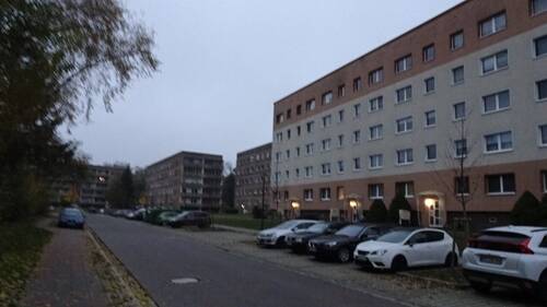 Gegenüberliegender Wohnblock - Grundstück in Friedland zum Kaufen