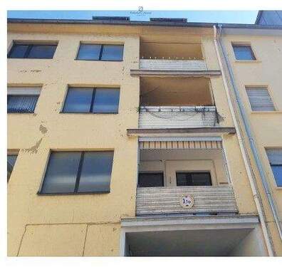 Gebäuderückseite mit 3 Balkonen - 1 Zimmer Mehrfamilienhaus, Wohnhaus zum Kaufen in Saarbrücken