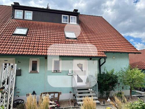 Titel - Platz für Familie und mehr...Geräumige DHH mit Garage in Wachenroth