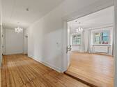 Flur mit Blick ins Wohnzimmer - 2 Zimmer Etagenwohnung in Konstanz
