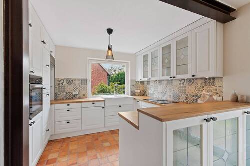 Markenküche von Häcker mit Miele- und Siemensgeräten; Bora Kochfeld mit Abzug - Doppelhaushälfte mit 127,00 m&sup2; in Hamburg zum Kaufen