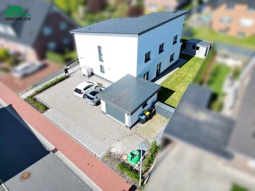 Luftaufnahme - 6 Zimmer Mehrfamilienhaus, Wohnhaus zum Kaufen in Beckdorf