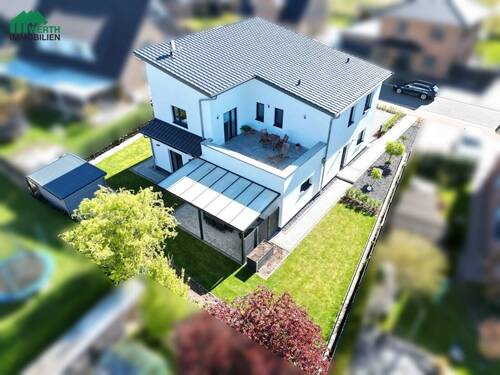 Luftaufnahme - 6 Zimmer Mehrfamilienhaus, Wohnhaus in Beckdorf