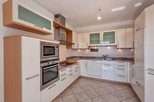 Gut ausgestattete Einbauküche - Etagenwohnung mit 106,10 m&sup2; in Olching zum Kaufen