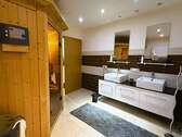 Badezimmer mit Sauna - 