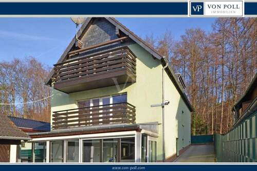 Titelbild-Rahmen - Zweifamilienhaus mit Einliegerwohnung - großer Garten und 3 Garagen