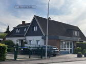 Bild 1 - DHH mit Gewerbeeinheit und Einliegerwohnung in Travemünde