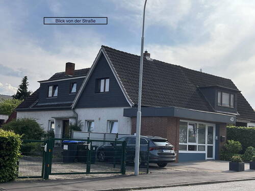 Bild 1 - DHH mit Gewerbeeinheit und Einliegerwohnung in Travemünde