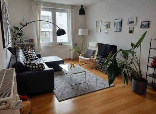 Wohnzim - (KI generiert) - *Cute & Pretty* 2 Zimmer Singlewohnung Nähe EZB zu vermieten