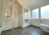 Geschmackvolles Duschbad en Suite - 