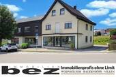 · - Wohn- und Geschäftshaus mit großem Gartengrundstück