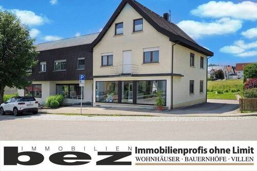 · - Wohn- und Geschäftshaus mit großem Gartengrundstück