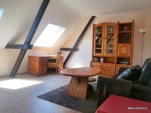 Wohnzimmer - 2 Zimmer Etagenwohnung in Krefeld
