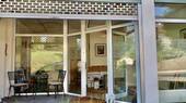 Eingang mit elektr. Schutzgitter - 
