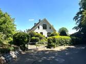 Blick aufs Haus von Westen - Solides Haus mit Potenzial in gefragter Lage - Oelixdorf bei Itzehoe
