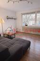 gemütliches Wohnzimmer - Etagenwohnung mit 71,00 m&sup2; in Elmshorn zum Kaufen