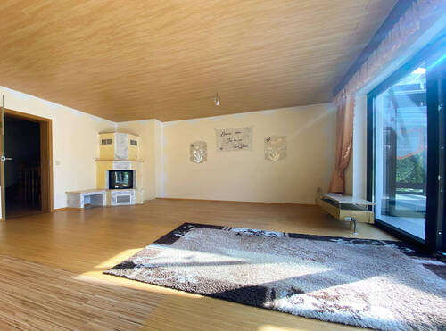 Wohnzimmer Wohneinheit links mit Elektrokamin - 