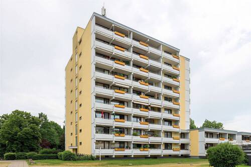 Bild 1 - Bezugsfreie Eigentumswohnung mit Balkon, Tiefgaragenstellplatz und Aufzug