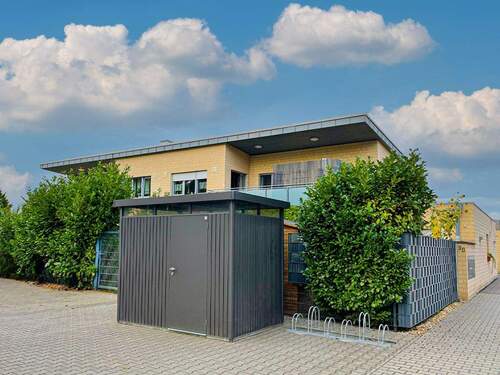 Bild 1 - Stilvolle 3-Zimmer-Wohnung mit Sonnenbalkon & Tiefgarage im Herzen von Jüchen!