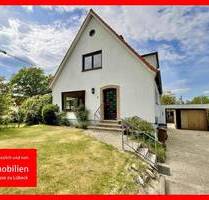 Einfamilienhaus mit großem Grundstück und Potenzial in Lübeck-Niendorf