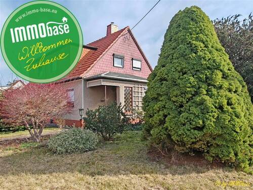 Willkommen Zuhause - Liebliche Doppelhaushälfte mit Garten und Garagen in ruhiger Lage!