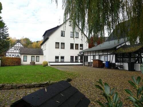 Rückansicht Wohn- und Geschäftshaus - 