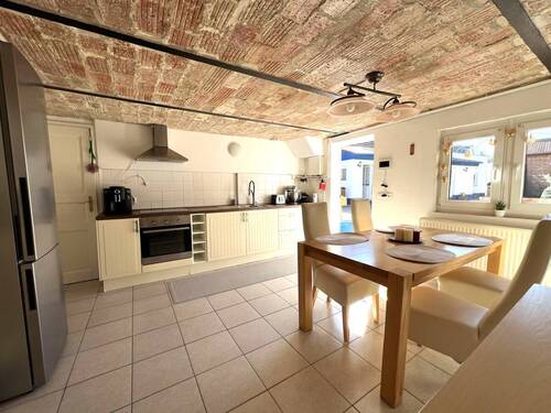 Ferienwohnung mit Küche und Essbereich - 