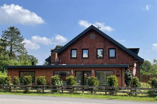 Seitenansicht - PROVISIONSFREI! Gepflegtes Mehrfamilienhaus mit Garten in Loxstedt!