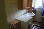 Bad mit Dusche und Waschmaschine - 