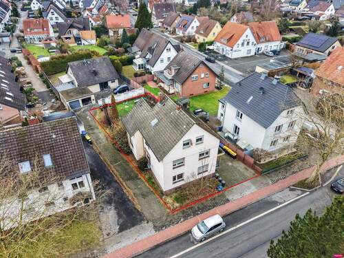 Außenansicht - Bebautes Grundstück mit genehmigter Planung für ein Sechsparteienhaus mit geförderten Wohnungen in Gütersloh-City!