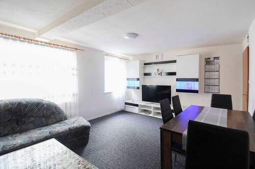 Wohnzimmer - 6 Zimmer Einfamilienhaus zum Kaufen in Murrhardt