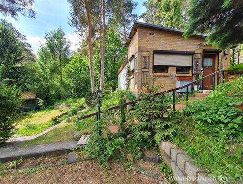 Wochenendbungalow mit späterem Anbau in Klinkerverkleidung - Einfamilienhaus mit 48,00 m&sup2; in Berlin / Wendenschloss zum Kaufen