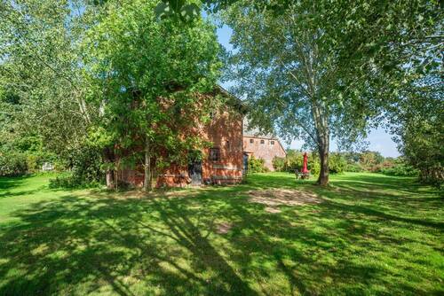 Rückansicht - 1 Zimmer Mehrfamilienhaus, Wohnhaus in Mehlbek