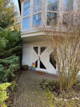 Hauseingang mit Wintergarten - 