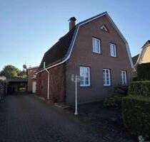 Viel Potenzial in Tornesch! Einfamilienhaus mit Teilkeller und Garage