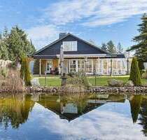 Einzigartiges Wohnen auf weitläufigem Traumgrundstück - Exklusives Einfamilienhaus mit Schwimmteich - Ahrensbök / Gnissau