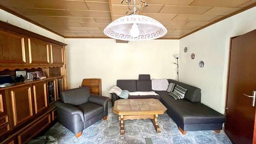 Wohnzimmer EG - 8 Zimmer Reihenendhaus in Lissendorf