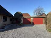 Auffahrt mit Garagen - Einfamilienhaus mit 170,80 m&sup2; in Wanderup zum Kaufen