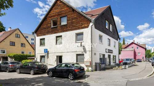 Außenansicht 3 - Solides Mehrfamilienhaus mit sechs Wohneinheiten, ca. 100m² Gaststätte und Parkplätzen