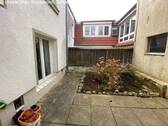Innenhof Whg.EG Mietshaus - 