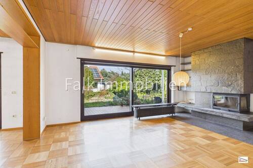 Wohnzimmer mit Zugang Terrasse+Garten - 