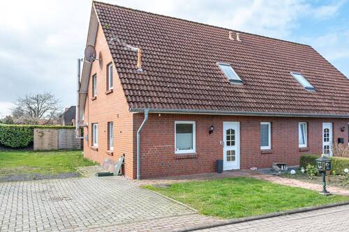Seitenansicht - Ihr neues Zuhause: Helle Doppelhaushälfte mit Terrasse, Garten und cleverem Grundriss