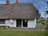 Gartenansicht neue DHH - Charmante Doppelhaushälfte mit Reetdach, großem Grundstück und Ausbaupotenzial in Neuendorf-Heide