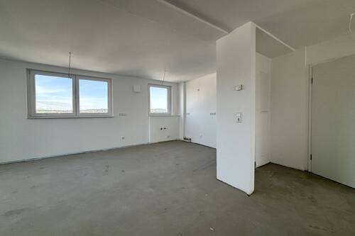 Küche und Essbereich - Modernes Wohnen mit A+ Effizienz und sonniger Dachterrasse