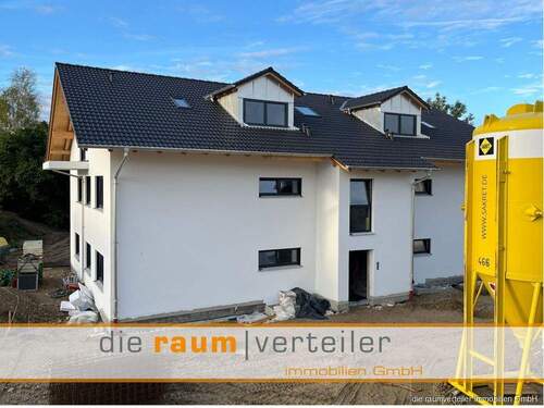 Ansicht I - Lichtdurchflutete Erdgeschosswohnung mit großzügigem Garten in Süd-West-Lage